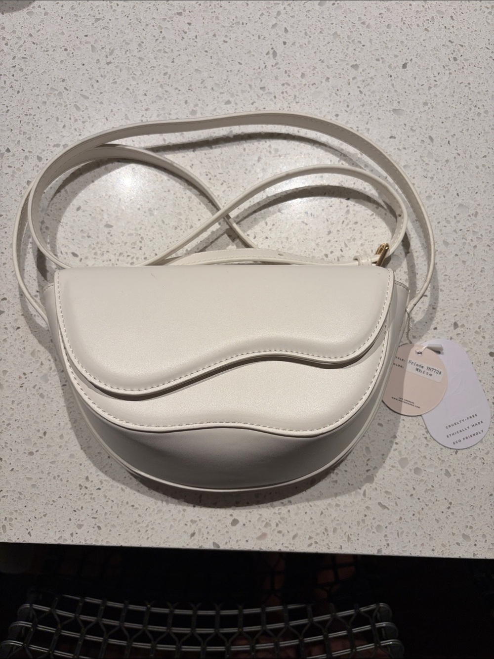 Melie Bianco White Curved Flap Crossbody Bag